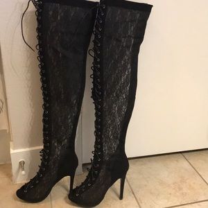 Thigh high boots.